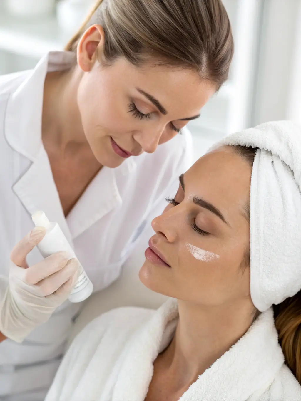 Close-up of a person's face during a skin analysis session, highlighting the personalized approach of Renati Med Spa & Wellness.